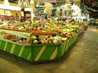  marchand de légumes au marché couvert